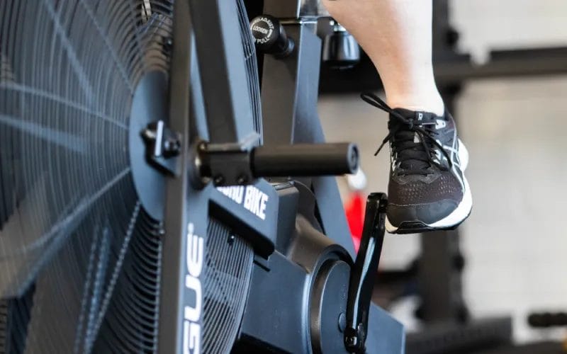 Woman riding gym bike