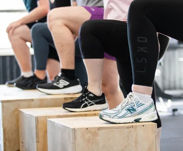 People doing box jump